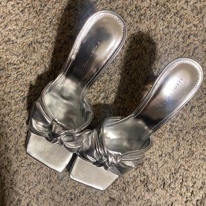 Women’s high heels slip on Mark Fisher shoes.